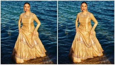 Her breathtaking attire is from the shelves of renowned fashion designer Manish Malhotra, showcasing his signature elegance and craftsmanship. The impeccable styling was done by celebrity fashion stylist Sanam Ratansi, who ensured every detail was perfect, (Instagram/@aditiraohydari) Her breathtaking attire is from the shelves of renowned fashion designer Manish Malhotra, showcasing his signature elegance and craftsmanship. The impeccable styling was done by celebrity fashion stylist Sanam Ratansi, who ensured every detail was perfect, (Instagram/@aditiraohydari)