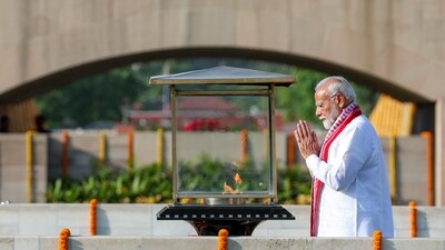 Modi performs 'parikrama' at Rajghat in New Delhi, paying homage to Mahatma Gandhi on Sunday. (BJP Media) Modi performs 'parikrama' at Rajghat in New Delhi, paying homage to Mahatma Gandhi on Sunday. (BJP Media)