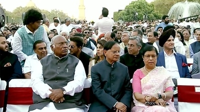 Congress President Mallikarjun Kharge, accompanied by Pramod Kumar Mishra, Principal Secretary to the PM, attends PM-designate Narendra Modi's oath ceremony at Rashtrapati Bhavan. (ANI) Congress President Mallikarjun Kharge, accompanied by Pramod Kumar Mishra, Principal Secretary to the PM, attends PM-designate Narendra Modi's oath ceremony at Rashtrapati Bhavan. (ANI)