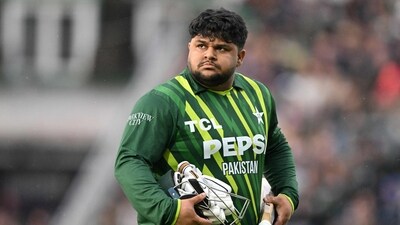 Pakistan's Azam Khan walks back to the pavilion having lost his wicket without scoring during the fourth T20 international cricket match (AFP) Pakistan's Azam Khan walks back to the pavilion having lost his wicket without scoring during the fourth T20 international cricket match (AFP)