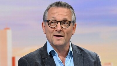 In this undated photo provided by the BBC on Sunday, June 9, 2024, doctor and broadcaster Michael Mosley speaks on Sunday with Laura Kuenssberg. Police said that a body believed to be that of missing British TV presenter Michael Mosley was found on a Greek island Sunday morning. A police spokesman, who spoke on condition of anonymity because of an ongoing investigation, said the body was found on a rocky coast by a private boat and that formal identification was pending. (Jeff Overs/BBC via AP) (AP) In this undated photo provided by the BBC on Sunday, June 9, 2024, doctor and broadcaster Michael Mosley speaks on Sunday with Laura Kuenssberg. Police said that a body believed to be that of missing British TV presenter Michael Mosley was found on a Greek island Sunday morning. A police spokesman, who spoke on condition of anonymity because of an ongoing investigation, said the body was found on a rocky coast by a private boat and that formal identification was pending. (Jeff Overs/BBC via AP) (AP)