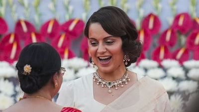 Kangana Ranaut brought her ‘movie star glow’ back for the event, looking stunning in a white saree and pearl jewellery. The Mandi MP looked radiant. (PTI) Kangana Ranaut brought her ‘movie star glow’ back for the event, looking stunning in a white saree and pearl jewellery. The Mandi MP looked radiant. (PTI)