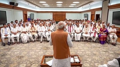 Prime Minister-designate Narendra Modi addresses a meeting with National Democratic Alliance (NDA) leaders before the swearing-in ceremony of the new Cabinet and council of ministers, at his residence in New Delhi on Sunday. (ANI) Prime Minister-designate Narendra Modi addresses a meeting with National Democratic Alliance (NDA) leaders before the swearing-in ceremony of the new Cabinet and council of ministers, at his residence in New Delhi on Sunday. (ANI)