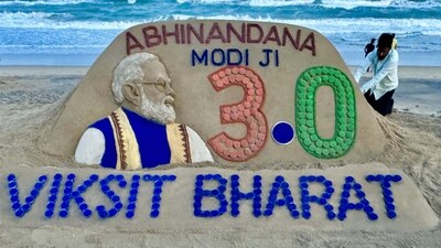 Puri: A sand sculpture for the oath taking ceremony of Prime Minister Narendra Modi at Puri beach in Odisha, Saturday, June 8, 2024. (PTI) Puri: A sand sculpture for the oath taking ceremony of Prime Minister Narendra Modi at Puri beach in Odisha, Saturday, June 8, 2024. (PTI)