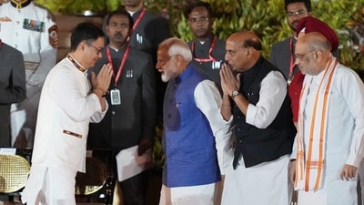 BJP leader Kiren Rijiju greets Prime Minister Narendra Modi, party MPs Rajnath Singh and Amit Shah at the swearing-in ceremony held at Rashtrapati Bhavan, in New Delhi, Sunday, June 9, 2024. (PTI Photo/Ravi Choudhary) BJP leader Kiren Rijiju greets Prime Minister Narendra Modi, party MPs Rajnath Singh and Amit Shah at the swearing-in ceremony held at Rashtrapati Bhavan, in New Delhi, Sunday, June 9, 2024. (PTI Photo/Ravi Choudhary)
