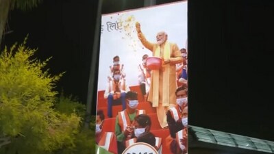 Posters of PM-designate Narendra Modi have been displayed across Delhi in anticipation of his swearing-in ceremony on Sunday. Posters of PM-designate Narendra Modi have been displayed across Delhi in anticipation of his swearing-in ceremony on Sunday.