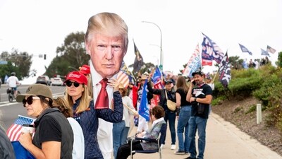 Supporters of former US President and 2024 Republican presidential candidate Donald Trump gather outside as Trump attends a fundraising event in Newport Beach, California, June 8, 2024. (Photo by Kyle Grillot / AFP) (AFP) Supporters of former US President and 2024 Republican presidential candidate Donald Trump gather outside as Trump attends a fundraising event in Newport Beach, California, June 8, 2024. (Photo by Kyle Grillot / AFP) (AFP)