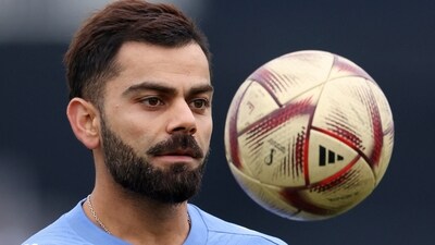 India's Virat Kohli plays football during the warm-up before the match. (REUTERS)