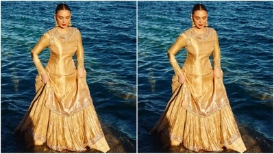 On Saturday, Aditi took to Instagram and uploaded a series of stunning pictures accompanied by the caption, "Bibbojaan is worth it! My first appearance in Cannes is a #lategram, channeling beauty vibes from my Amma and my Rekha ma. In gold, Malli poo (flowers), and a bottu (bindi)." (Instagram/@aditiraohydari) On Saturday, Aditi took to Instagram and uploaded a series of stunning pictures accompanied by the caption, "Bibbojaan is worth it! My first appearance in Cannes is a #lategram, channeling beauty vibes from my Amma and my Rekha ma. In gold, Malli poo (flowers), and a bottu (bindi)." (Instagram/@aditiraohydari)