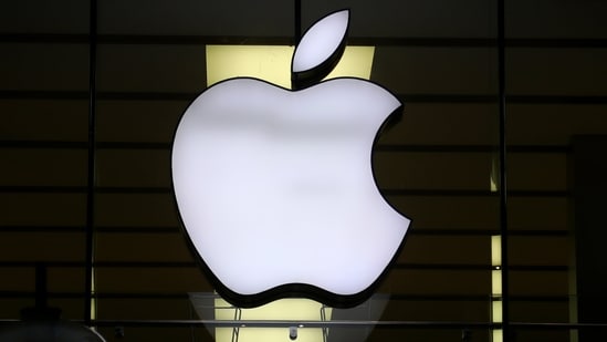 FILE - The Apple logo is illuminated at a store in the city center in Munich, Germany (AP)