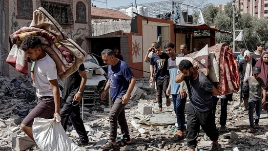 Aid delivered to Gaza from newly repaired US-built pier (Photo by Bashar TALEB / AFP) (AFP)