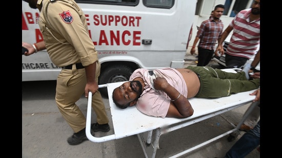 The accused is undergoing treatment at the civil hospital after he was thrashed by passers-by on Saturday. He will be arrested on Monday after being discharged from hospital, said police. (HT Photo)