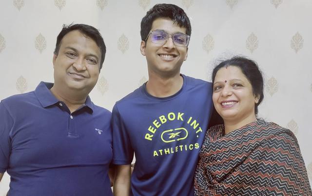 Mayank Jain with his family. He also aspires to join IIT Bombay to study computer science engineering. (HT Photo) Mayank Jain with his family. He also aspires to join IIT Bombay to study computer science engineering. (HT Photo)