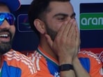 Rohit Sharma and Virat Kohli react to Pakistan's fielding error. Rohit Sharma and Virat Kohli react to Pakistan's fielding error.