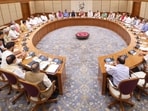  Prime Minister Narendra Modi chairs the first meeting of his new Cabinet, attended by the newly-inducted ministers, at the prime minister's 7, Lok Kalyan Marg residence. (PTI Photo)
