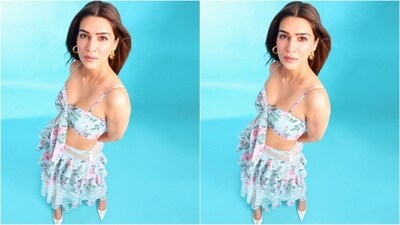 Her outfit is from the shelves of her sister's newly launched brand, Label Nobo. She styled her look with golden statement hoop earrings, a silver chain necklace, and white pointy high heels, perfectly complementing her chic ensemble. (Instagram/@kritisanon) Her outfit is from the shelves of her sister's newly launched brand, Label Nobo. She styled her look with golden statement hoop earrings, a silver chain necklace, and white pointy high heels, perfectly complementing her chic ensemble. (Instagram/@kritisanon)
