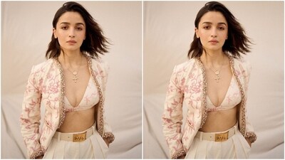 Assisted by celebrity fashion stylist Priyanka Kapadia Badani, Alia styled her stunning look with a multi-layered golden chain necklace featuring quirky pendants and white high heels, perfectly complementing her ensemble. (Instagram/@aliaabhatt)