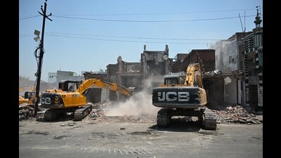 A demolition drive underway in Akbar Nagar on Monday (Mushtaq Ali/HT) A demolition drive underway in Akbar Nagar on Monday (Mushtaq Ali/HT)