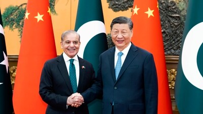 In this photo released by Xinhua News Agency, Chinese President Xi Jinping meets with Pakistani Prime Minister Shehbaz Sharif at the Great Hall of the People in Beijing, Friday, June 7, 2024. Beijing is willing to work with Islamabad to build an upgraded version of an economic corridor linking the two countries, China's leader Xi Jinping told the visiting Pakistani Prime Minister Shehbaz Sharif Friday.AP/PTI(AP06_07_2024_000444B) (AP) In this photo released by Xinhua News Agency, Chinese President Xi Jinping meets with Pakistani Prime Minister Shehbaz Sharif at the Great Hall of the People in Beijing, Friday, June 7, 2024. Beijing is willing to work with Islamabad to build an upgraded version of an economic corridor linking the two countries, China's leader Xi Jinping told the visiting Pakistani Prime Minister Shehbaz Sharif Friday.AP/PTI(AP06_07_2024_000444B) (AP)