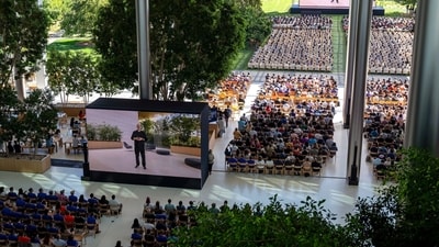 Attendees watch the keynote presentation during the Apple Worldwide Developers Conference at Apple Park campus in Cupertino, California, US, on Monday, June 10, 2024. (Bloomberg) Attendees watch the keynote presentation during the Apple Worldwide Developers Conference at Apple Park campus in Cupertino, California, US, on Monday, June 10, 2024. (Bloomberg)