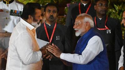 BJP leader Suresh Gopi greets Prime Minister Narendra Modi as taking oath as minister of state at Rashtrapati Bhavan on Sunday. (Hindustan Times/Ajay Aggarwal) BJP leader Suresh Gopi greets Prime Minister Narendra Modi as taking oath as minister of state at Rashtrapati Bhavan on Sunday. (Hindustan Times/Ajay Aggarwal)