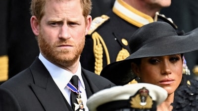 Britain's Meghan, Duchess of Sussex, cries as she, Prince Harry, Duke of Sussex, Queen Camilla and King Charles attend the state funeral and burial of Britain's Queen Elizabeth, in London, Britain, September 19, 2022. (REUTERS)