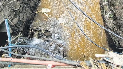 Cable at a nallah on Sinhagad Road. (MAHENDRA KOLHE/HT PHOTO) Cable at a nallah on Sinhagad Road. (MAHENDRA KOLHE/HT PHOTO)