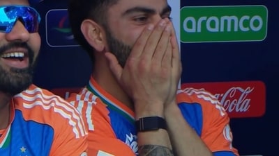 Rohit Sharma and Virat Kohli react to Pakistan's fielding error. Rohit Sharma and Virat Kohli react to Pakistan's fielding error.