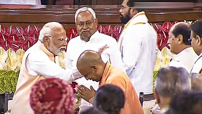 **EDS: VIDEO GRAB VIA SANSAD TV** New Delhi: Senior BJP leader Narendra Modi being greeted by Uttar Pradesh CM Yogi Adityanath during the NDA parliamentary party meeting at Samvidhan Sadan, in New Delhi, Friday, June 7, 2024. (PTI Photo)(PTI06_07_2024_000227B) (PTI) **EDS: VIDEO GRAB VIA SANSAD TV** New Delhi: Senior BJP leader Narendra Modi being greeted by Uttar Pradesh CM Yogi Adityanath during the NDA parliamentary party meeting at Samvidhan Sadan, in New Delhi, Friday, June 7, 2024. (PTI Photo)(PTI06_07_2024_000227B) (PTI)