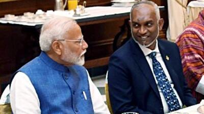 Prime Minister Narendra Modi interacts with Maldives President Mohamed Muizzu during a banquet hosted by President Droupadi Murmu for the leaders of neighbouring countries who attended the swearing-in ceremony of the PM at Rashtrapati Bhavan in New Delhi on Sunday (President of India-X) Prime Minister Narendra Modi interacts with Maldives President Mohamed Muizzu during a banquet hosted by President Droupadi Murmu for the leaders of neighbouring countries who attended the swearing-in ceremony of the PM at Rashtrapati Bhavan in New Delhi on Sunday (President of India-X)