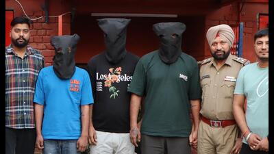 The accused in police custody in Jalandhar on Monday. The accused in police custody in Jalandhar on Monday.