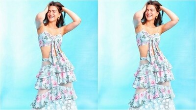 On Sunday, Kriti gave her fans a weekend treat as she took to Instagram and uploaded a series of stunning pictures accompanied by the caption, “Meet the Sanon Entrepreneurs!”. In the post, she can be seen striking playful poses in a blue printed top and frilly skirt. (Instagram/@kritisanon) On Sunday, Kriti gave her fans a weekend treat as she took to Instagram and uploaded a series of stunning pictures accompanied by the caption, “Meet the Sanon Entrepreneurs!”. In the post, she can be seen striking playful poses in a blue printed top and frilly skirt. (Instagram/@kritisanon)