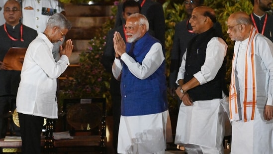 Bharatiya Janata Party (BJP) leader, S. Jaishankar greets Prime Minister Narendra Modi after he takes oath as a cabinet minister during the swearing-in ceremony of the NDA government. (Hindustan Times)