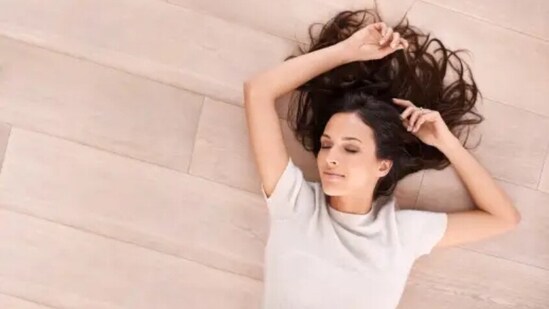 Lying down on the floor is the ultimate grounding technique. It helps us to feel relaxed and calm. We can try lying down on the ground.&nbsp;(Unsplash)