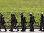 Russian army servicemen walk at an exhibition displaying armoured vehicles and equipment captured by the Russian army from Ukrainian forces in Moscow, Russia on May 31