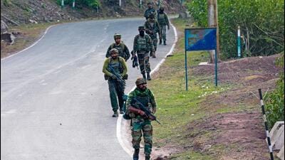 Indian Army personnel patrolling a stretch in Reasi district on Monday during a search operation after terrorists ambushed a bus carrying pilgrims on Sunday evening. Nine people were killed and 42 injured in the attack. (AFP Photo) Indian Army personnel patrolling a stretch in Reasi district on Monday during a search operation after terrorists ambushed a bus carrying pilgrims on Sunday evening. Nine people were killed and 42 injured in the attack. (AFP Photo)