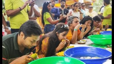 Mango lovers participating at mango eating competition (HT Photo) Mango lovers participating at mango eating competition (HT Photo)