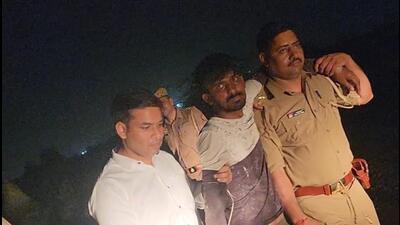 One of the suspects who was arrested from Surajpur following a gunfight with the police on Monday night, (HT Photo) One of the suspects who was arrested from Surajpur following a gunfight with the police on Monday night, (HT Photo)