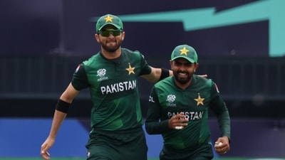 Pakistan's Babar Azam celebrates with Shaheen Shah Afridi during the T20 World Cup match against India. (REUTERS)