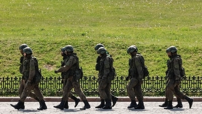 Russian army servicemen walk at an exhibition displaying armoured vehicles and equipment captured by the Russian army from Ukrainian forces in Moscow, Russia on May 31 (REUTERS)