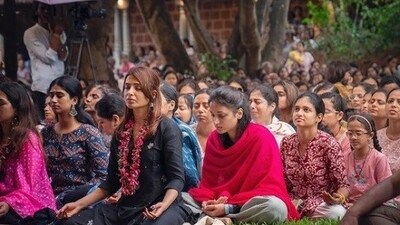 Samantha's photo dump included her meditating among other followers. She wore an all-black salwar suit with matching earrings. She looked serene meditating with her eyes closed, resting in Sukhasana, and with a red rose garland around her neck. Samantha's photo dump included her meditating among other followers. She wore an all-black salwar suit with matching earrings. She looked serene meditating with her eyes closed, resting in Sukhasana, and with a red rose garland around her neck.