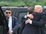 Joe Biden seen hugging Hunter in public show of support (Photo by ANDREW CABALLERO-REYNOLDS / AFP) Joe Biden seen hugging Hunter in public show of support (Photo by ANDREW CABALLERO-REYNOLDS / AFP)