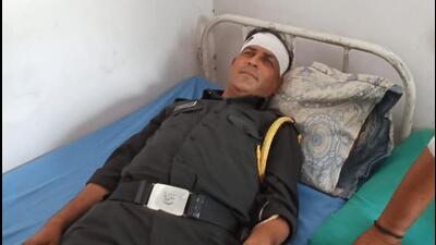 A member of the team who was injured in the attack by squatters on Wednesday. (HT Photo) A member of the team who was injured in the attack by squatters on Wednesday. (HT Photo)