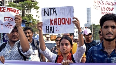 Students stage a protest against the alleged irregularities in the NEET-UG examination results and demand re-examination, in Kolkata on Monday. (ANI Photo) (saikat paul) Students stage a protest against the alleged irregularities in the NEET-UG examination results and demand re-examination, in Kolkata on Monday. (ANI Photo) (saikat paul)