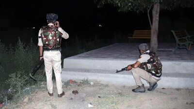 Security personnel are in a position as an operation is going on after villagers in the Hiranagar area of Kathua heard some gunshots on Tuesday. (ANI Photo) Security personnel are in a position as an operation is going on after villagers in the Hiranagar area of Kathua heard some gunshots on Tuesday. (ANI Photo)