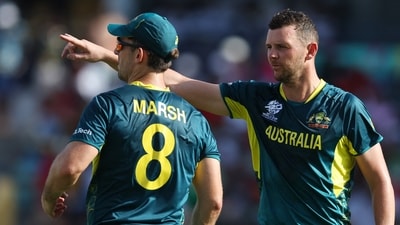 Australia's Josh Hazlewood and Mitchell Marsh talks during play (REUTERS)