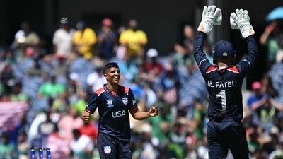 Nosthush Kenjige (C) of the United States celebrates with captain Monank Patel (AFP) Nosthush Kenjige (C) of the United States celebrates with captain Monank Patel (AFP)