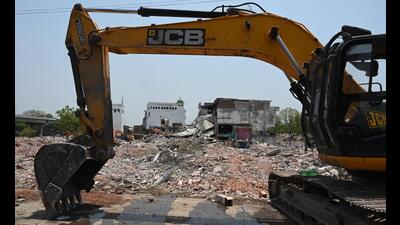 Demolition drive underway at Akbar Nagar on Wednesday. (Deepak Gupta/ HT Photo)