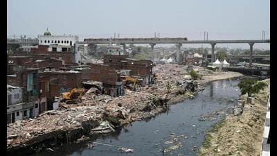Encroachments are being removed from the riverbed. (Deepak Gupta/HT Photo) Encroachments are being removed from the riverbed. (Deepak Gupta/HT Photo)