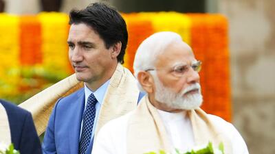 FILE - Canada's Prime Minister Justin Trudeau, left, walks past India's Prime Minister Narendra Modi as they take part in a wreath-laying ceremony at Raj Ghat, Mahatma Gandhi's cremation site, during the G20 Summit in New Delhi, File) (AP FILE) FILE - Canada's Prime Minister Justin Trudeau, left, walks past India's Prime Minister Narendra Modi as they take part in a wreath-laying ceremony at Raj Ghat, Mahatma Gandhi's cremation site, during the G20 Summit in New Delhi, File) (AP FILE)